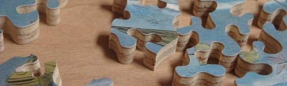 800px-Close_up_of_Hand_Cut_Jigsaw_Puzzle-590x177.jpg